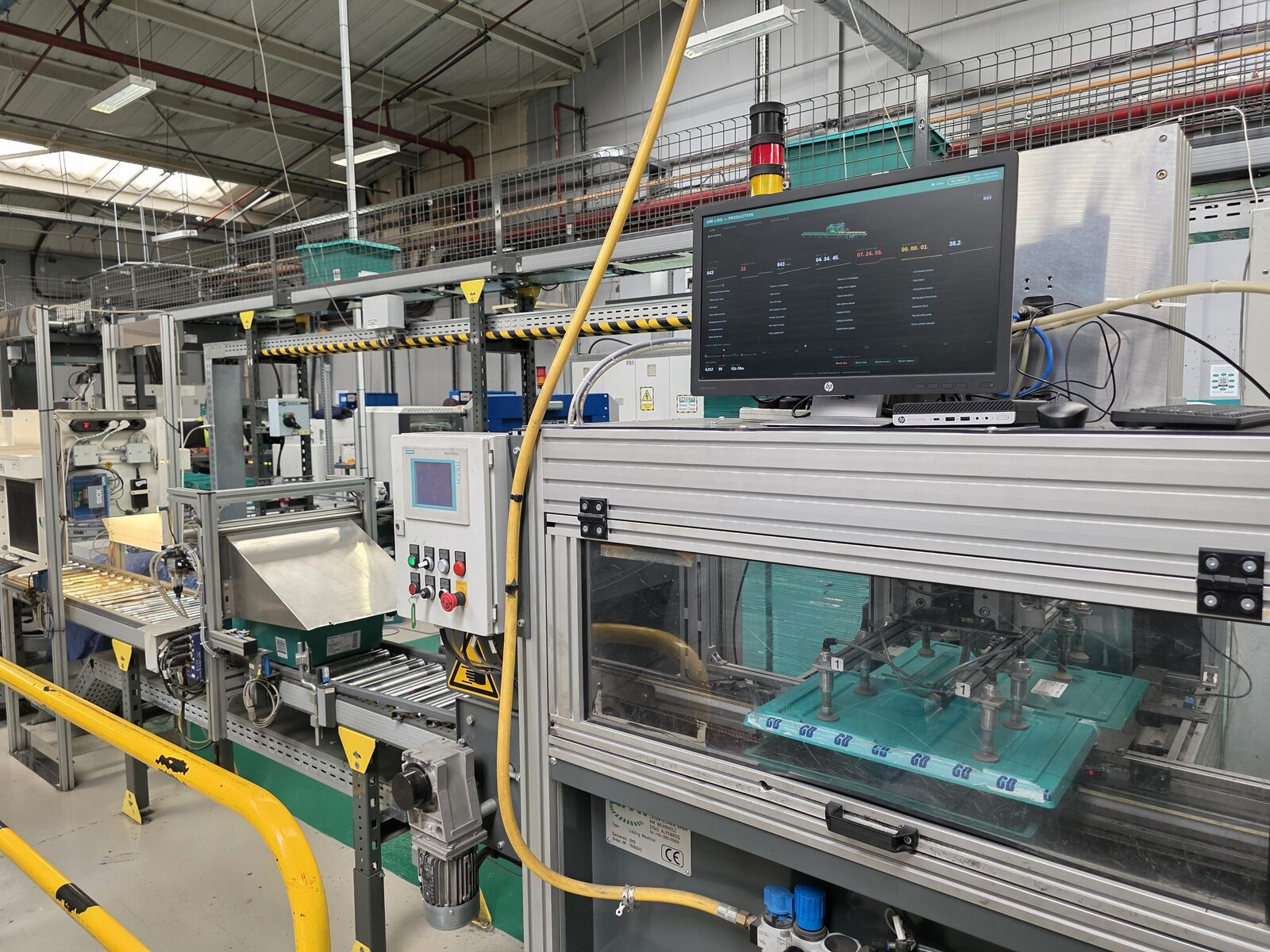 AMI lidding machine production line with monitoring dashboard